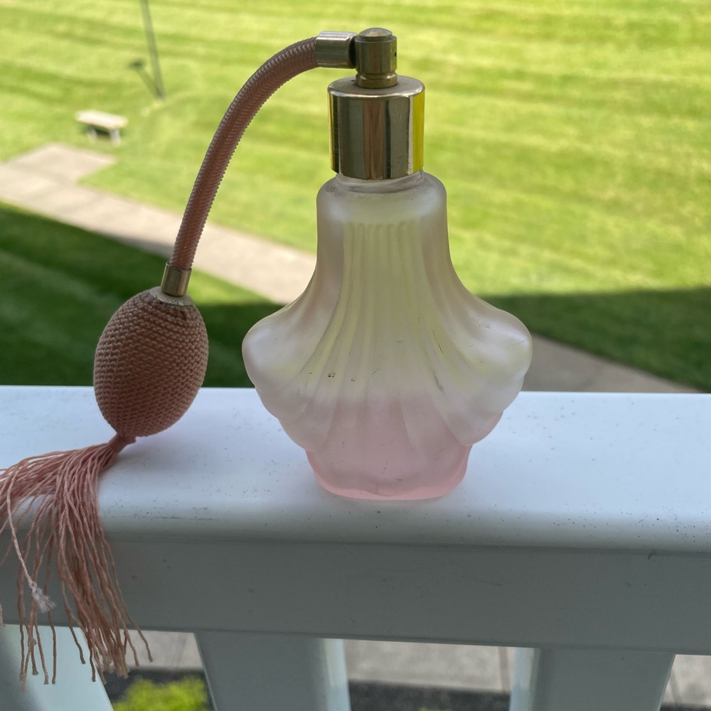Vintage pink art deco inspired perfume bottle